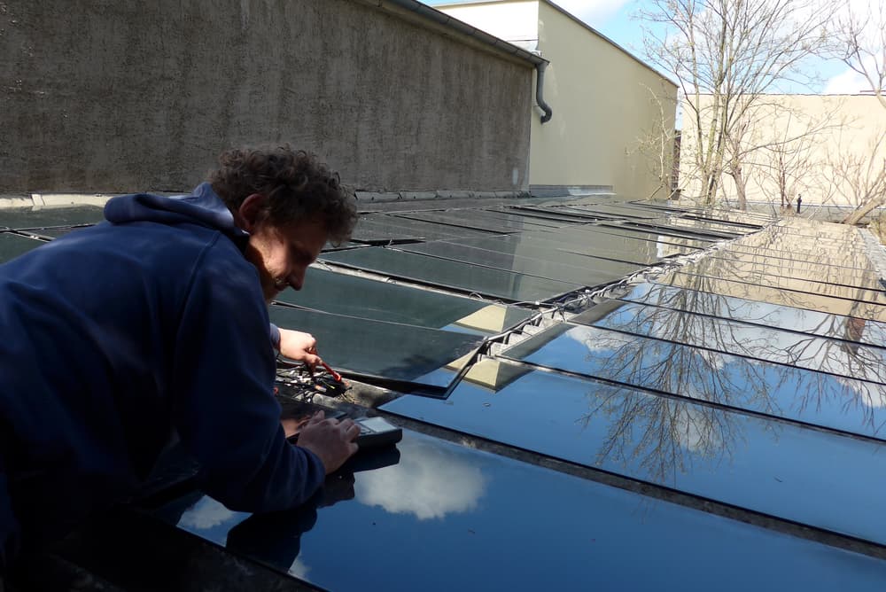 Bodhi connecting the solar panels
