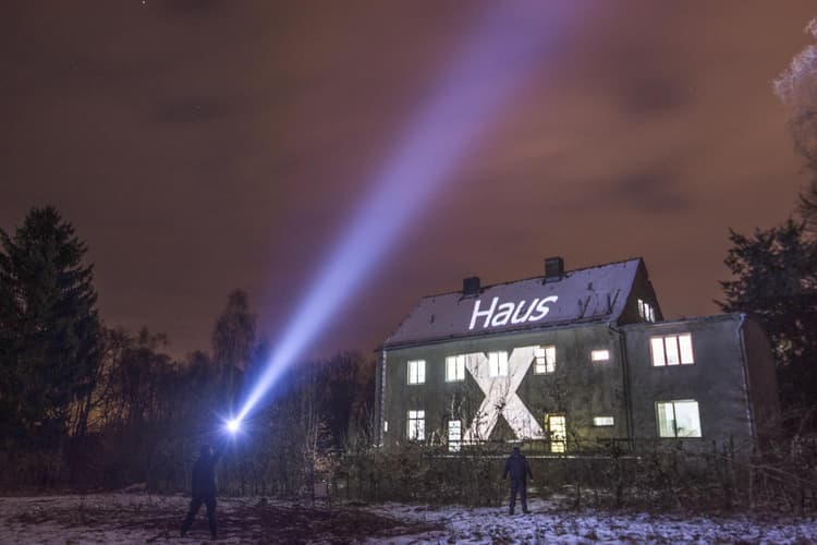 Haus X fancily illuminated